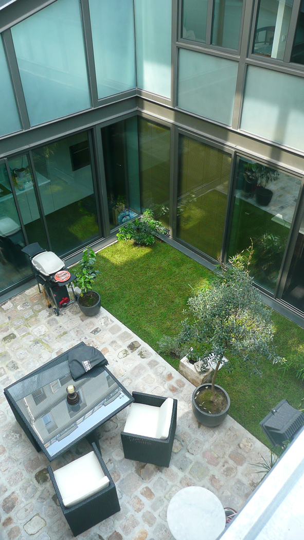 Réalisation d'une maison à patio à paris 17e